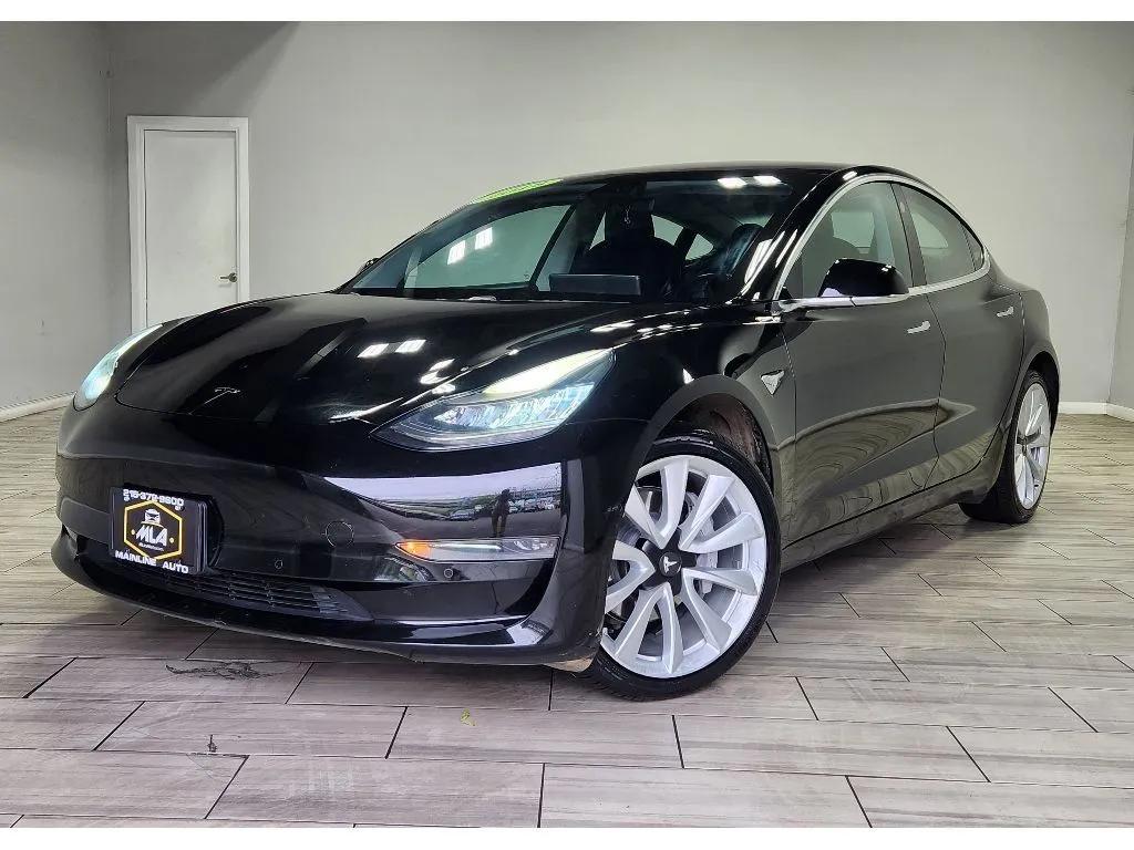 tesla model 3 2018 5YJ3E1EA4JF154509 image tesla model 3 2018 5YJ3E1EA4JF154509 image